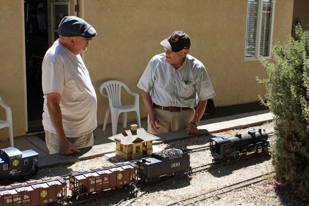 Dave Hayes enlightens Walt Wajda on the importance of keeping the tender coupled with the locomotive.